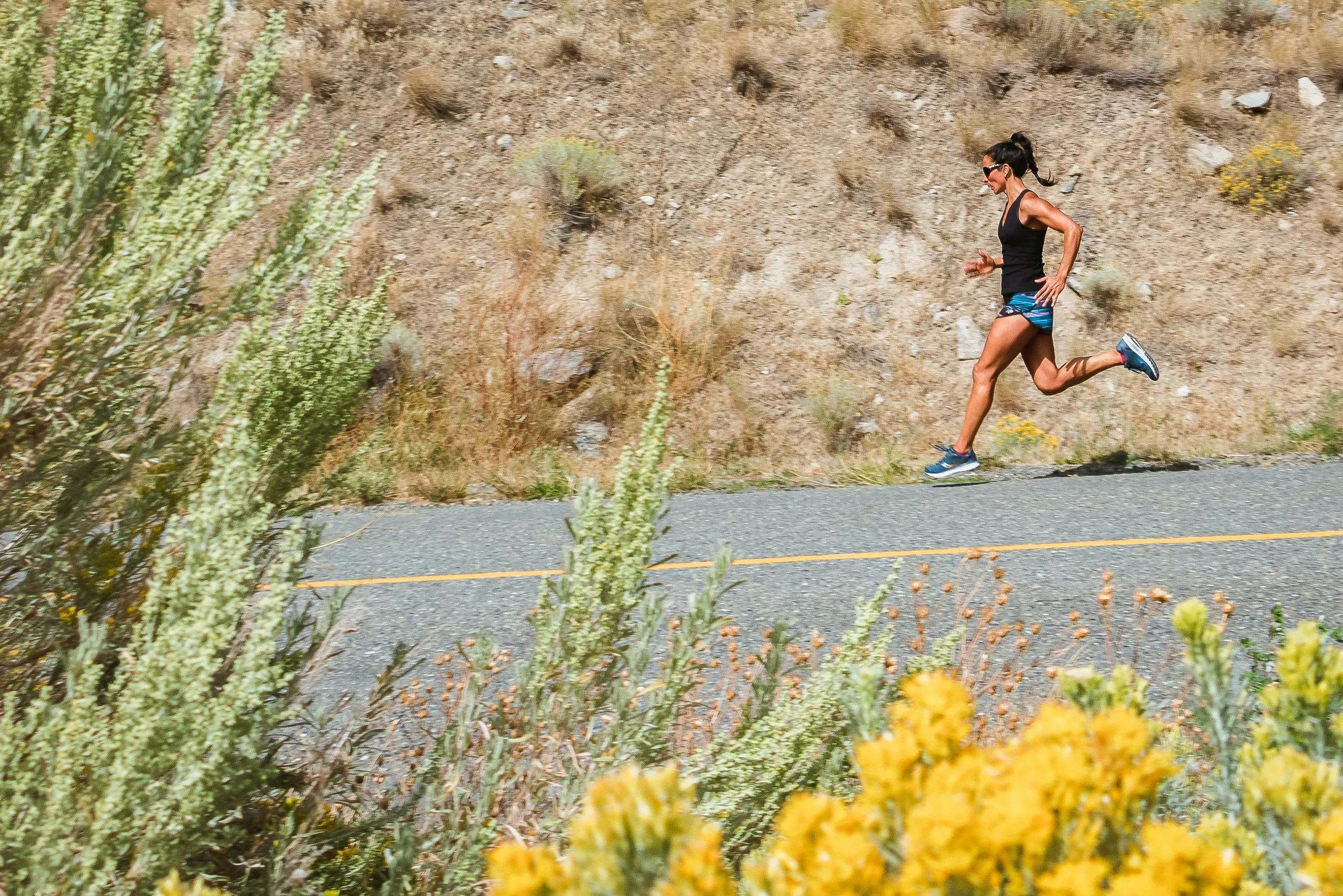 A runner moving along an outdoor trail